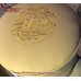 Машинная вышивка логотипа салона красоты на кожаных изделиях